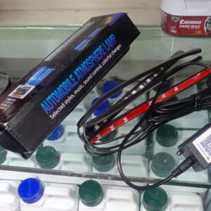 Upgrade your car’s interior with the Car Atmosphere Light (12 LED Model), a smart ambient lighting system designed to create a stylish and modern driving experience. This advanced RGB lighting kit includes 12 high-brightness LED modules that provide vibrant and customizable lighting inside your vehicle.  With multiple color options and lighting modes, you can easily set the mood according to your preference. The included remote control allows you to adjust colors, brightness, and effects, while the music sync feature makes the lights react to sound, creating a dynamic and immersive atmosphere.  The flexible and easy-to-install design allows you to place the LED strips under the dashboard, seats, or doors. Built with durable materials and energy-efficient LEDs, this lighting kit ensures long-lasting performance without draining your car battery.  Perfect for car enthusiasts who want to enhance both the look and feel of their vehicle interior, this 12 LED atmosphere light kit adds a premium touch to any car.